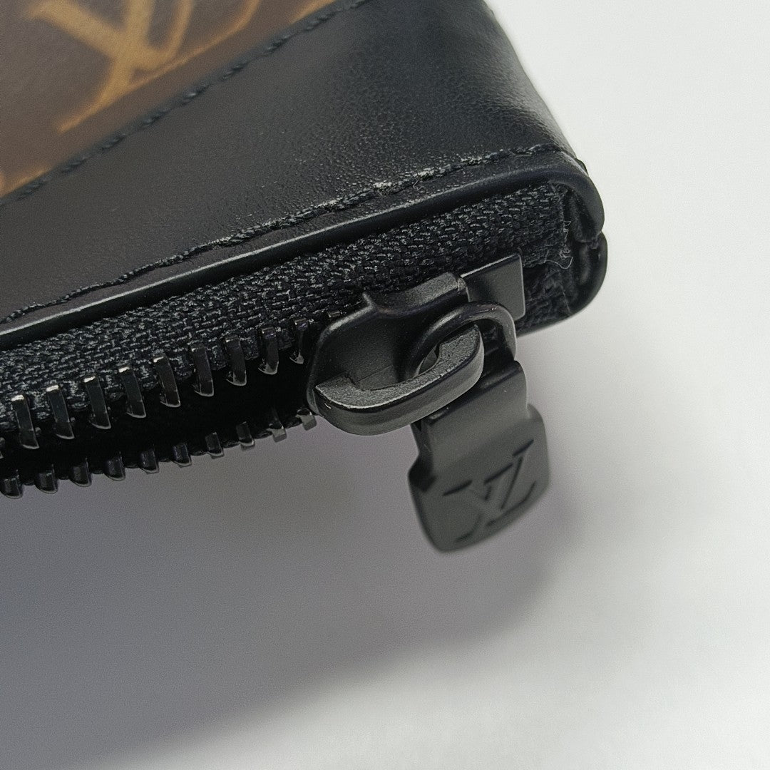 DISCOVERY Monogram Coated Canvas Brown