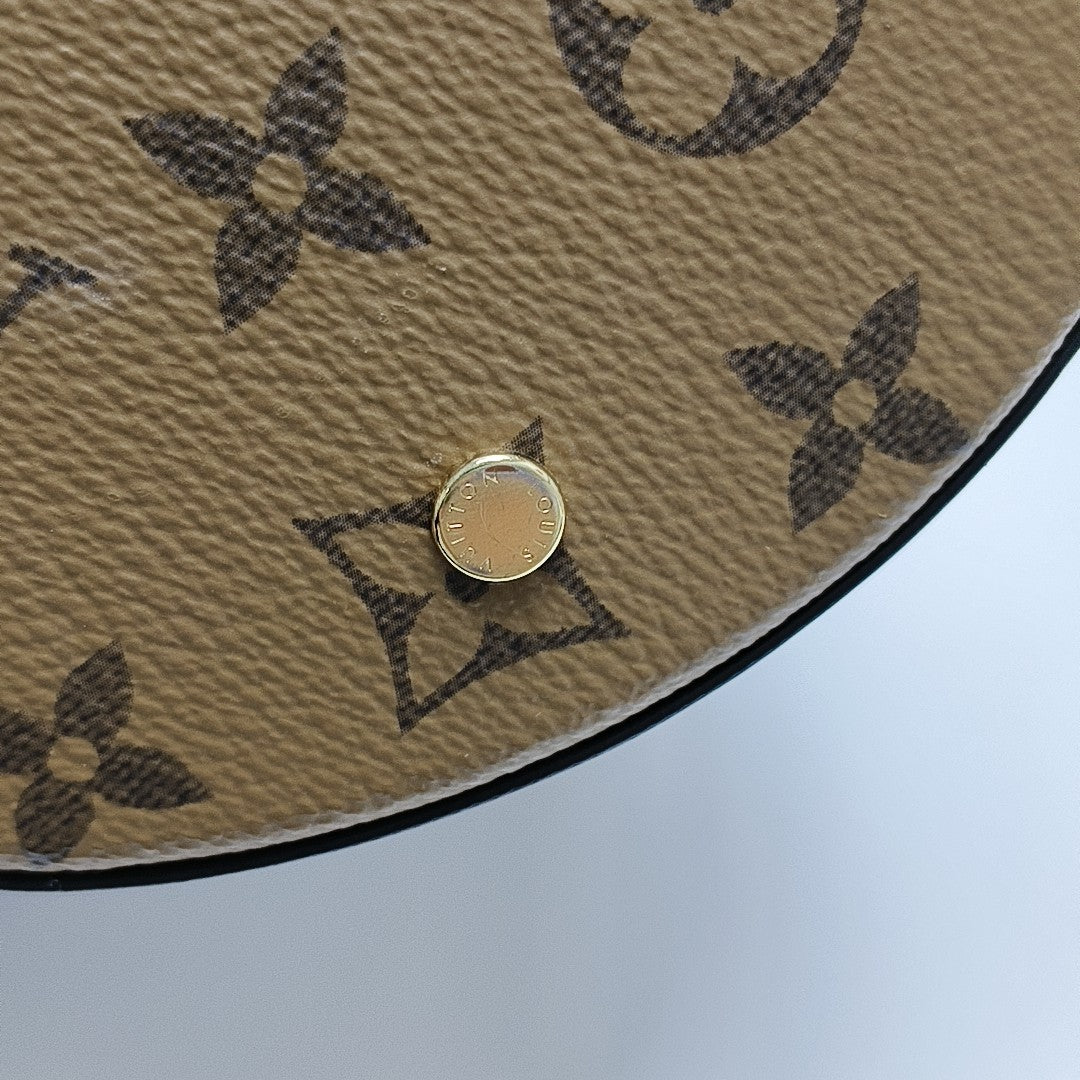 CANNES PM Monogram Coated Canvas Brown