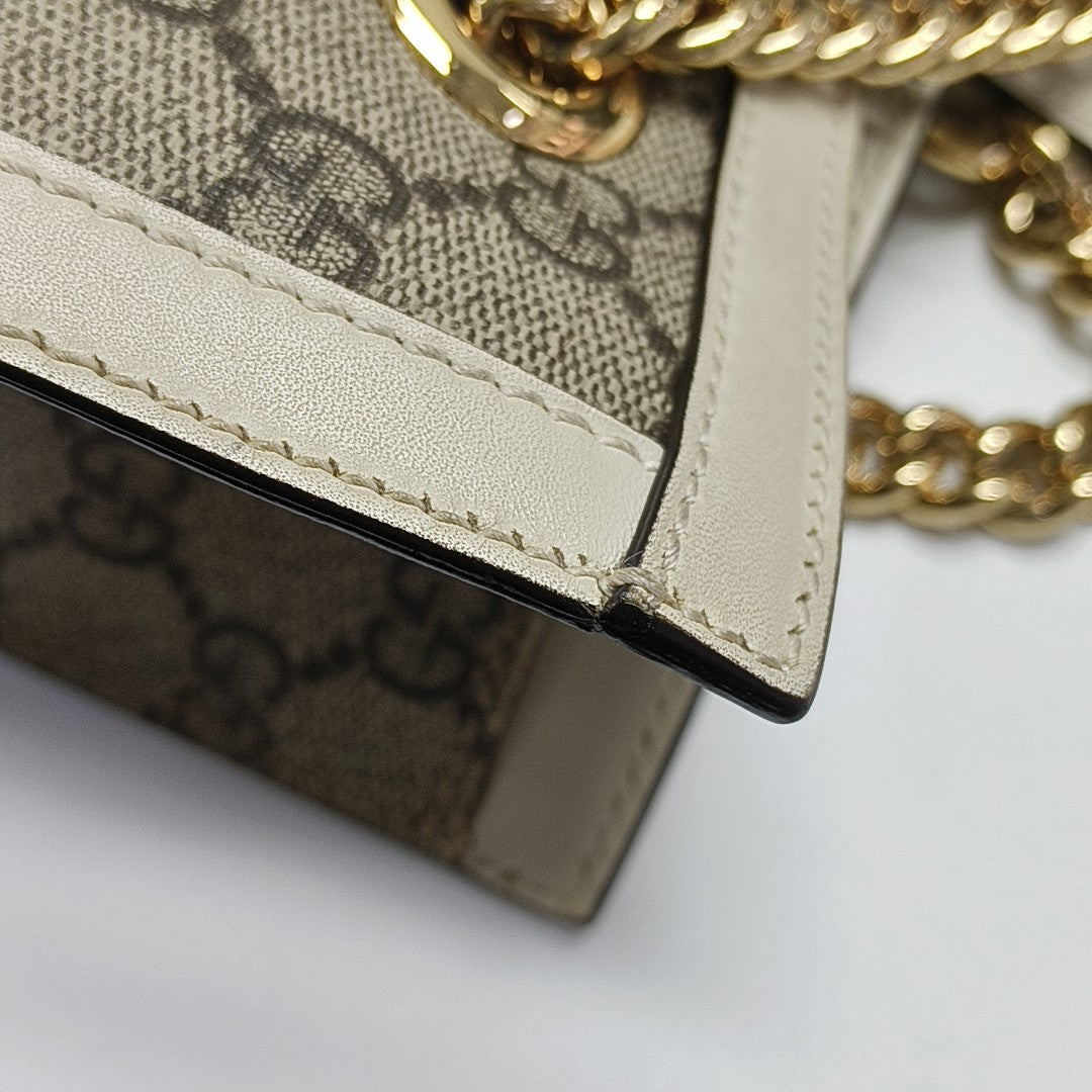 Padlock Small Monogram Coated Canvas Beige