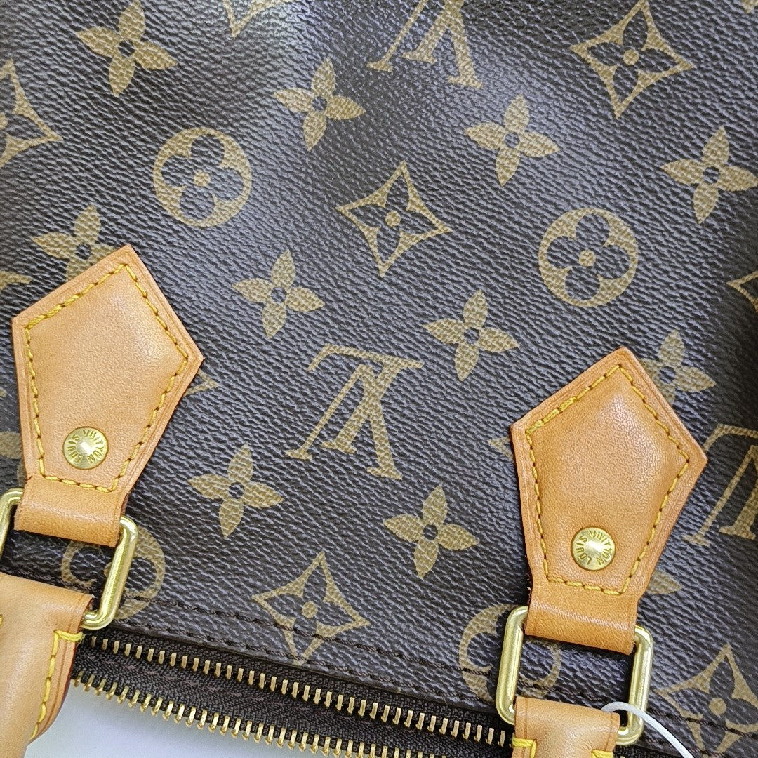 SPEEDY 25 Monogram Coated Canvas Brown