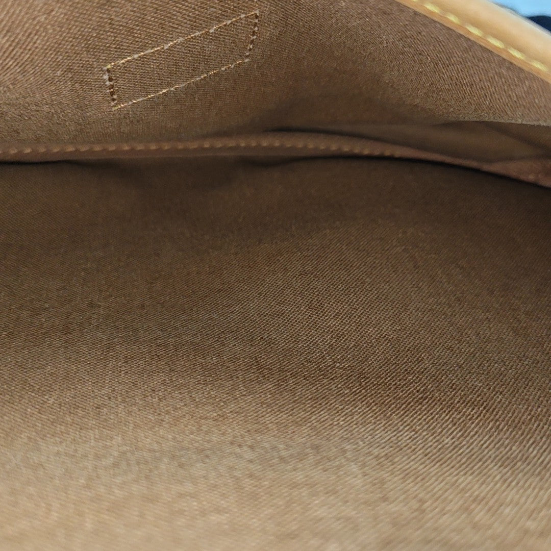 SAUMUR 30 Monogram Coated Canvas Brown