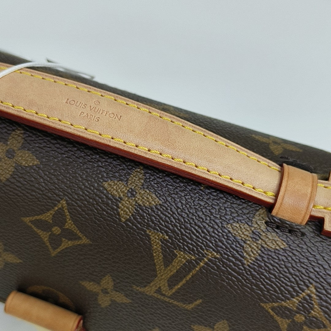 MÉTIS EAST WEST Monogram Coated Canvas Brown
