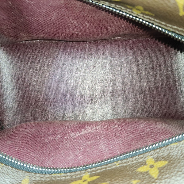 Monogram Coated Canvas Clutch Brown