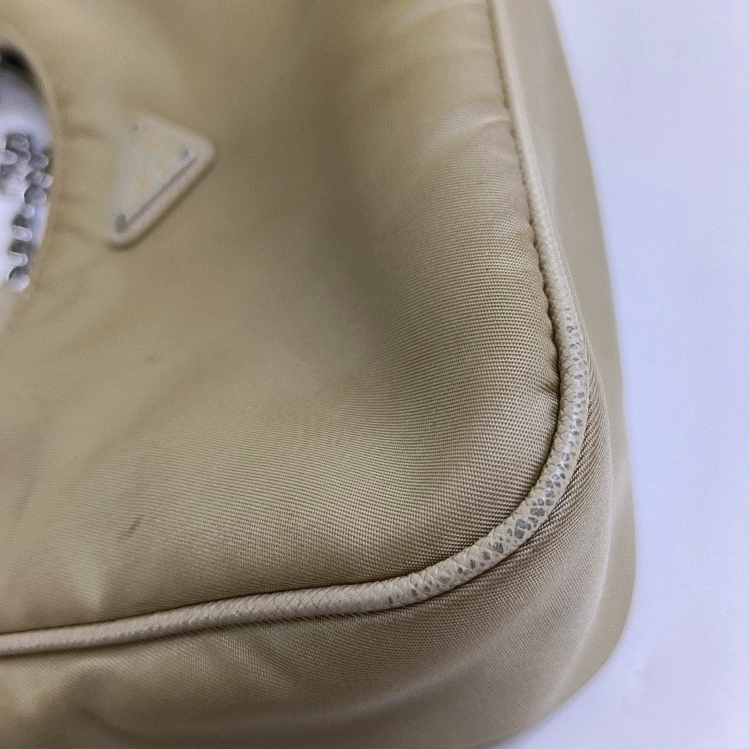 Authenticated pre-owned  Re-Edition2005 Nylon Beige - Crossbody Bag at Looply