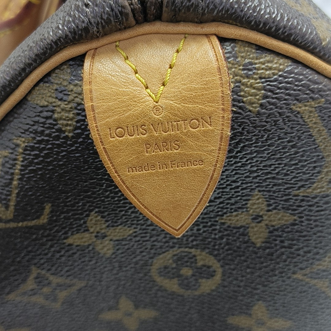 SPEEDY 30 Monogram Coated Canvas Brown