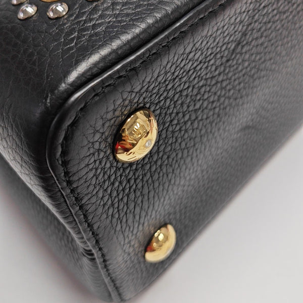 Authenticated pre-owned  CAPUCINES MM Calfskin Black - Shoulder Bag at Looply