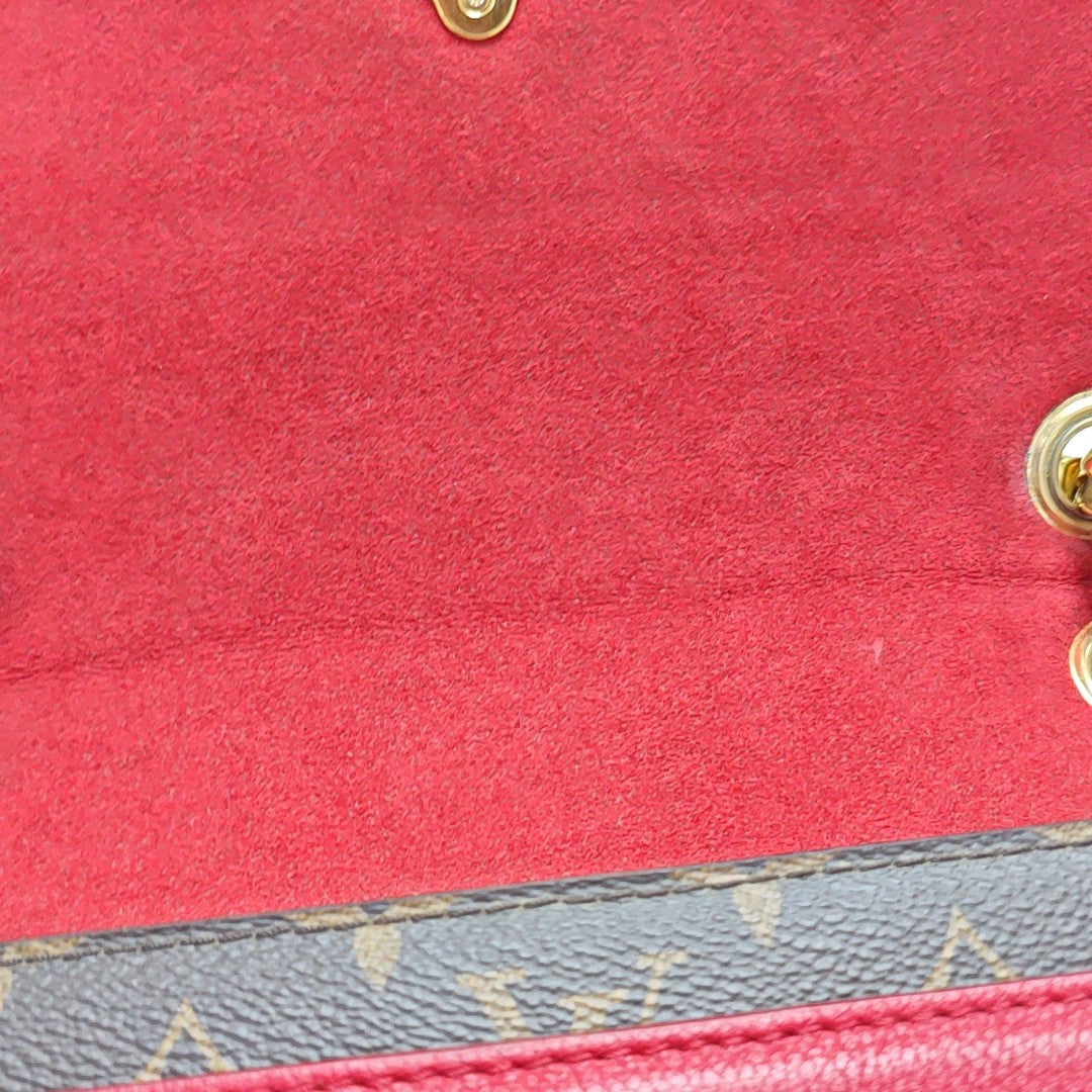 VICTOIRE Monogram Coated Canvas Brown