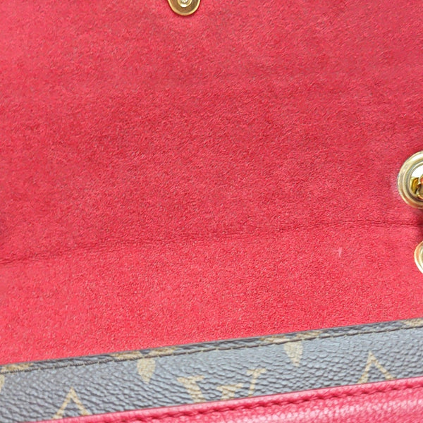 VICTOIRE Monogram Coated Canvas Brown