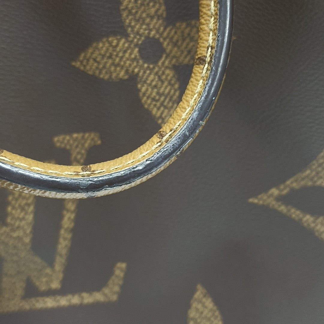 ONTHEGO GM Monogram Coated Canvas Brown