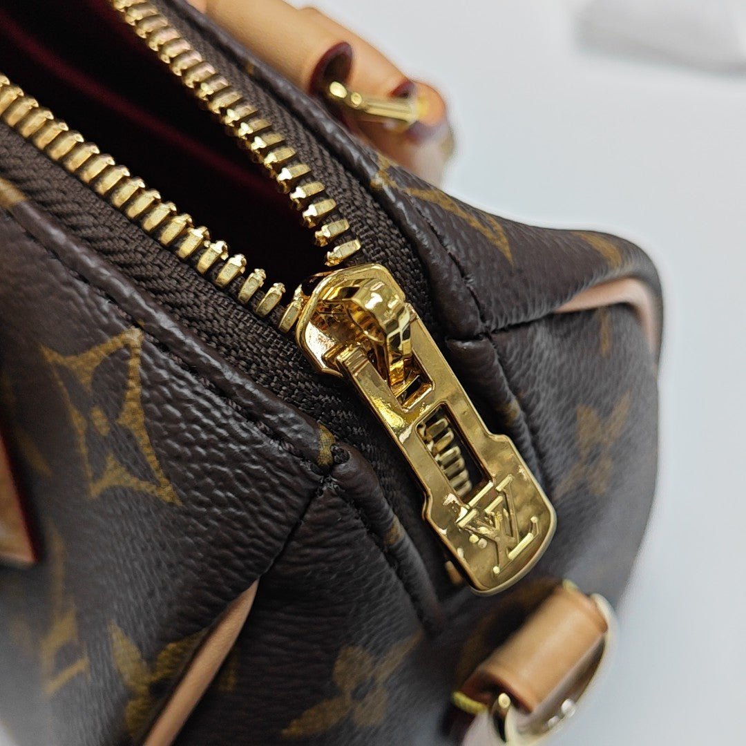 SPEEDY 20 Monogram Coated Canvas Brown