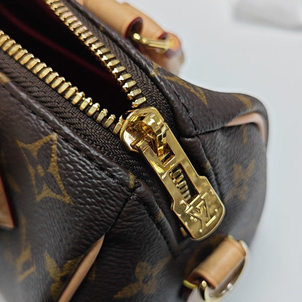 SPEEDY 20 Monogram Coated Canvas Brown