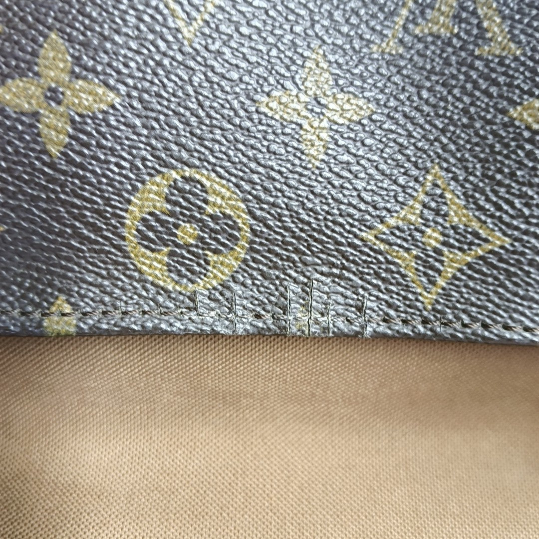 LOOPING PM Monogram Coated Canvas Brown