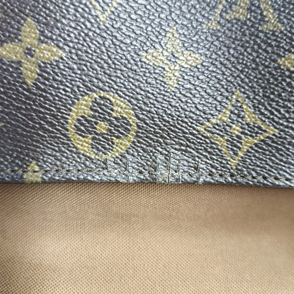LOOPING PM Monogram Coated Canvas Brown