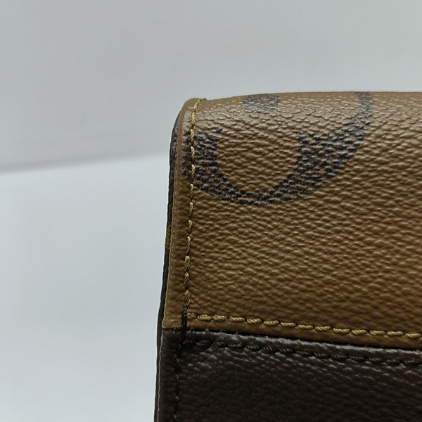 ONTHEGO PM Monogram Coated Canvas Brown