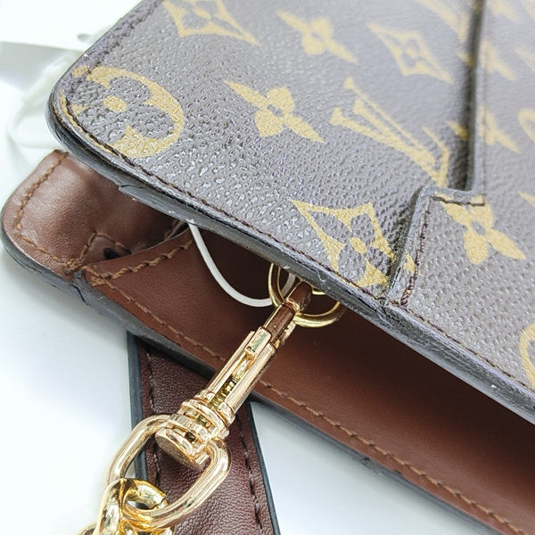 Monogram Coated Canvas Clutch Brown