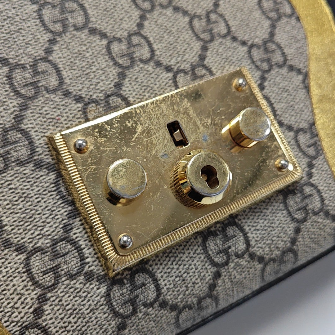 Padlock Small Monogram Coated Canvas Beige
