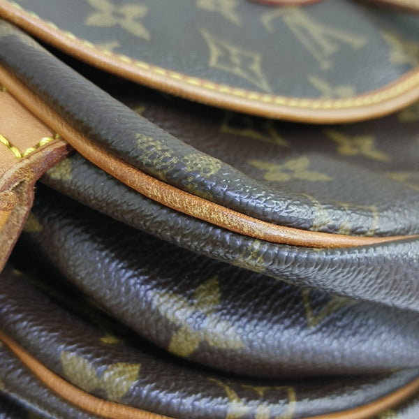 SAUMUR Monogram Coated Canvas Brown