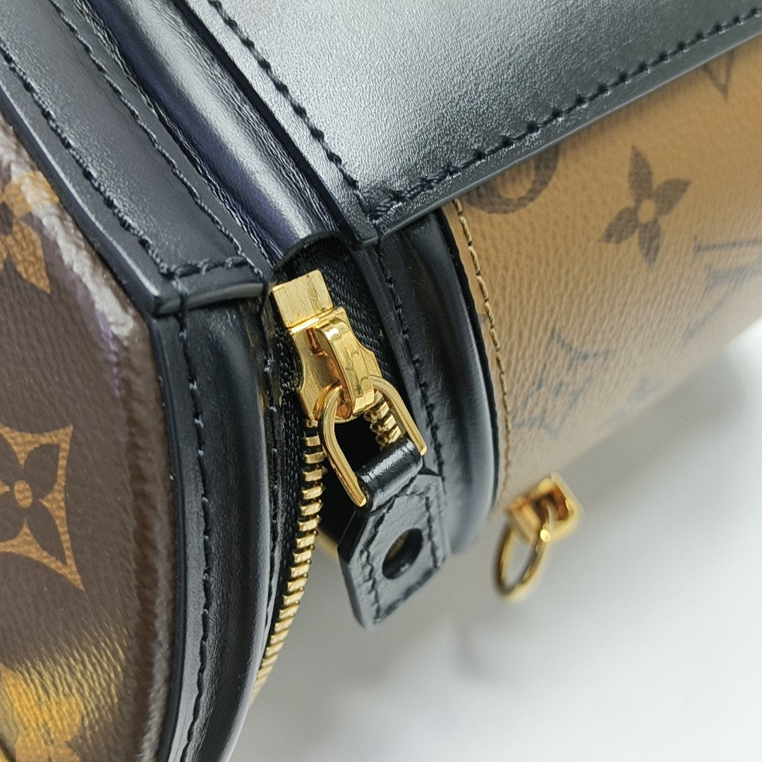 CANNES PM Monogram Coated Canvas Brown