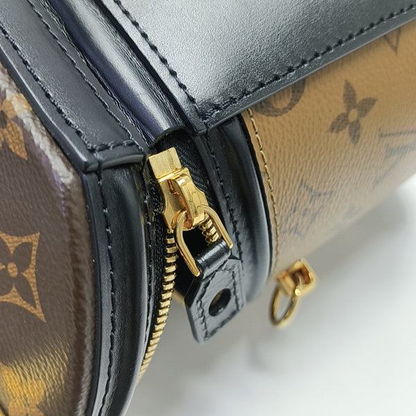 CANNES PM Monogram Coated Canvas Brown