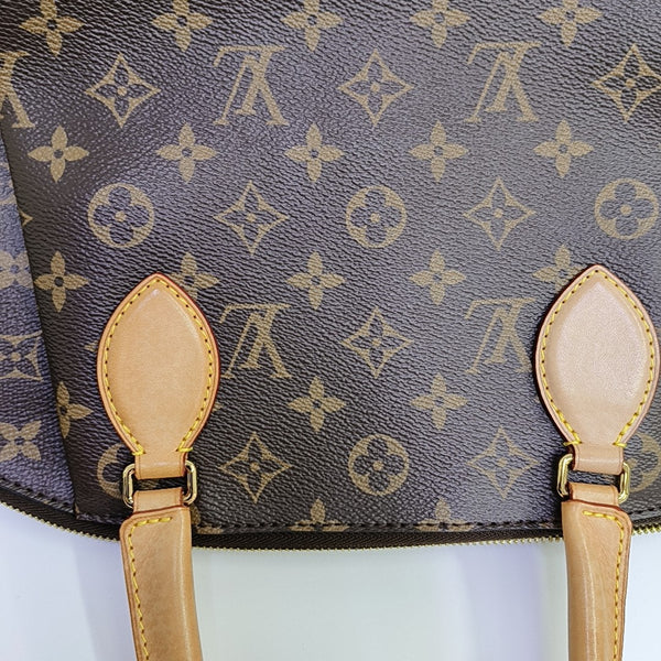 RIVOLI MM Monogram Coated Canvas Brown