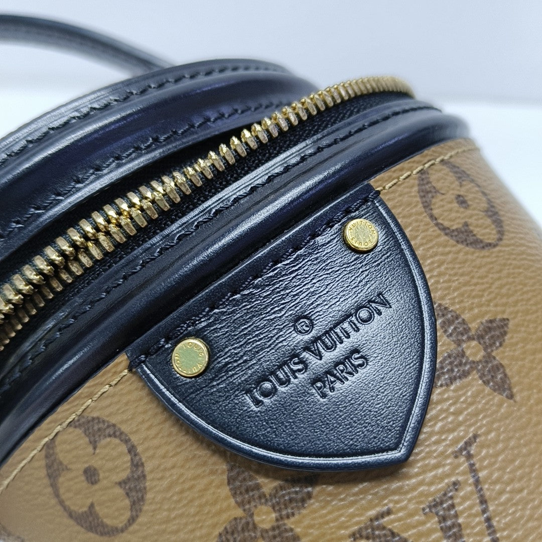 CANNES PM Monogram Coated Canvas Brown