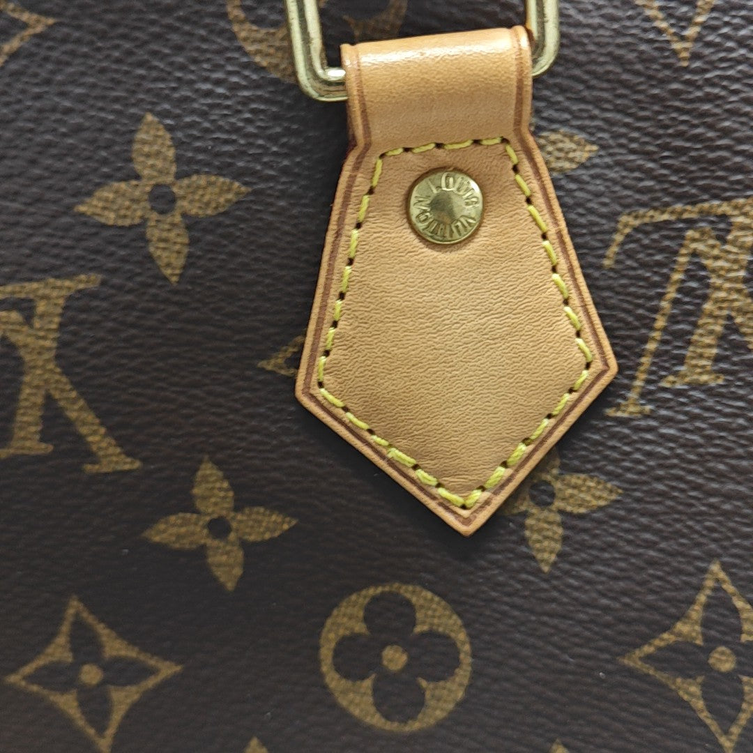 SPEEDY 25 Monogram Coated Canvas Brown