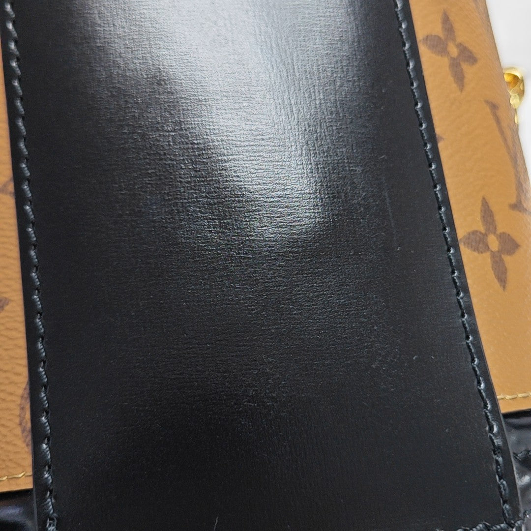 CANNES PM Monogram Coated Canvas Brown