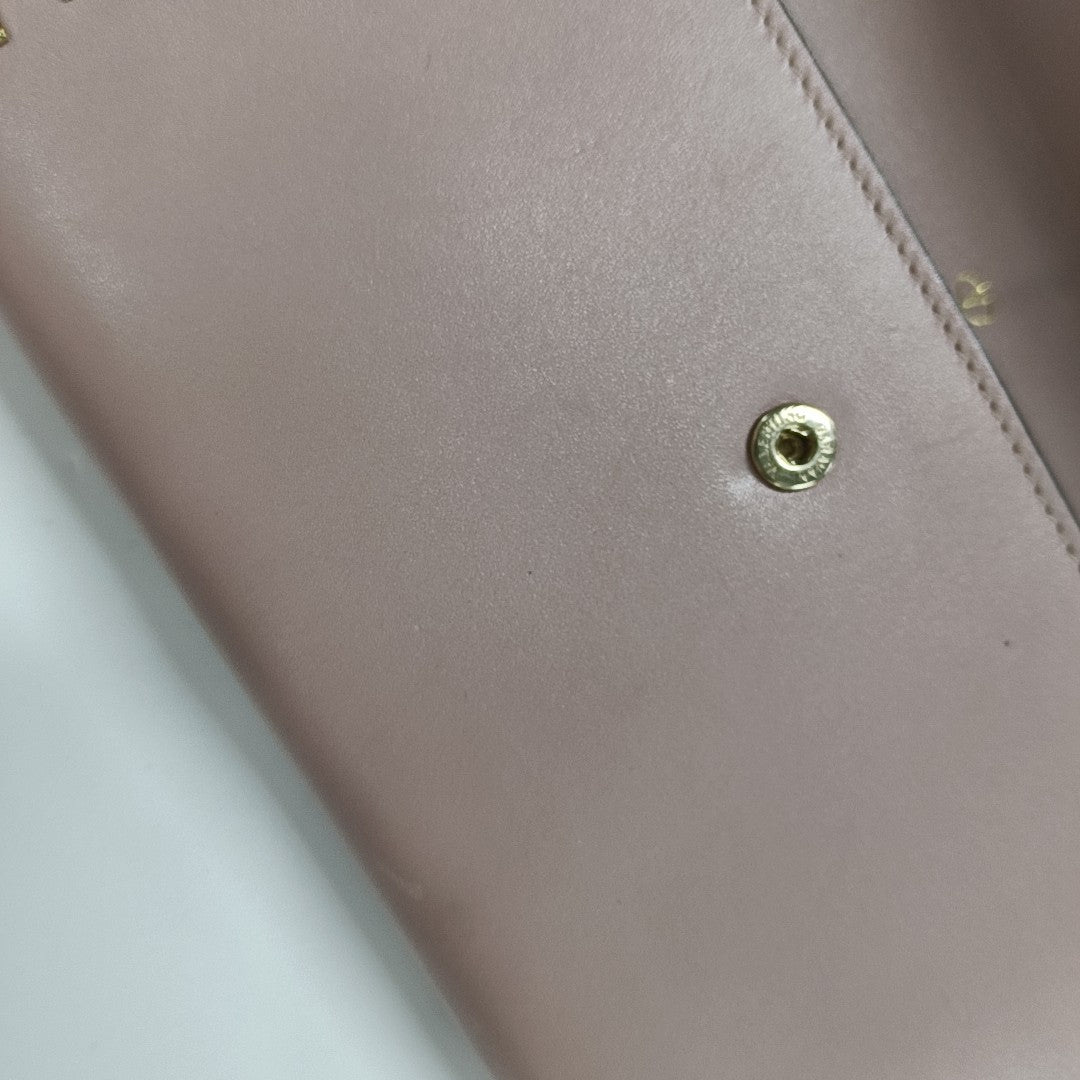 Cartera rosa de piel de ternera Rockstud