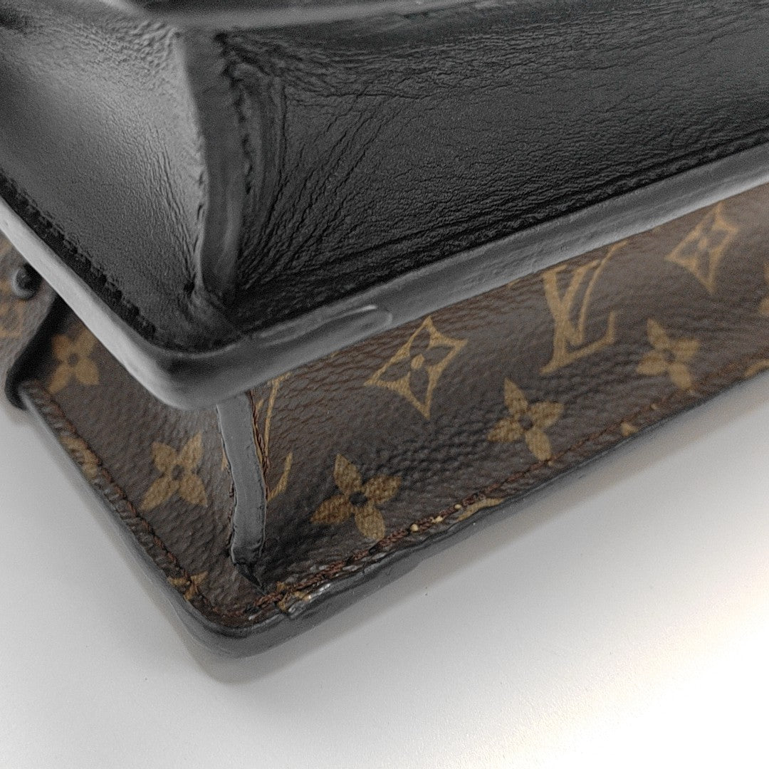 TRUNK Monogram Coated Canvas Brown