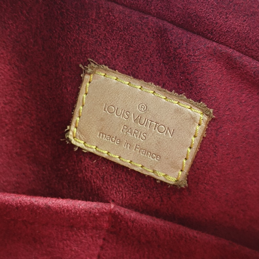 MULTIPLE Monogram Coated Canvas Brown