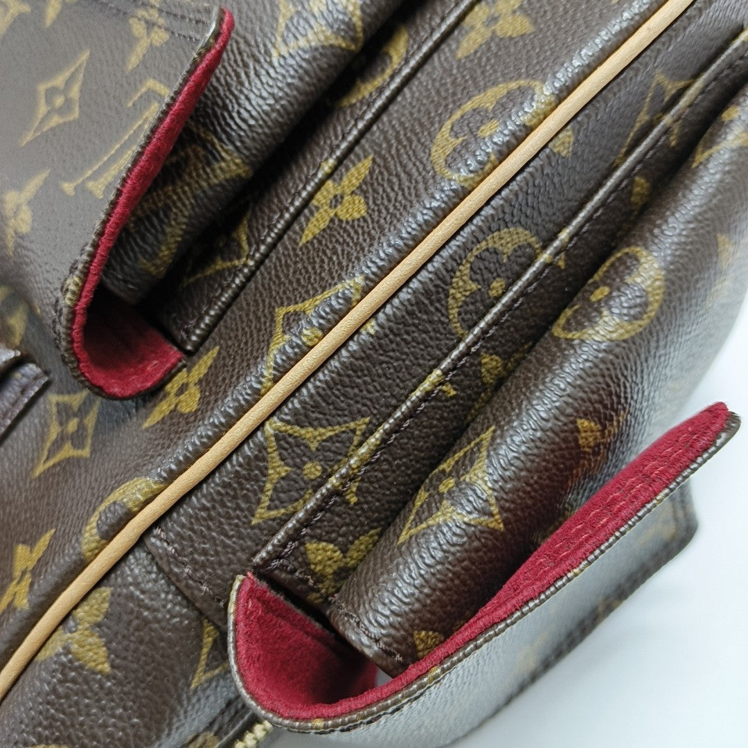 EXCENTRI-CITE Monogram Coated Canvas Brown