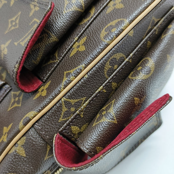 EXCENTRI-CITE Monogram Coated Canvas Brown