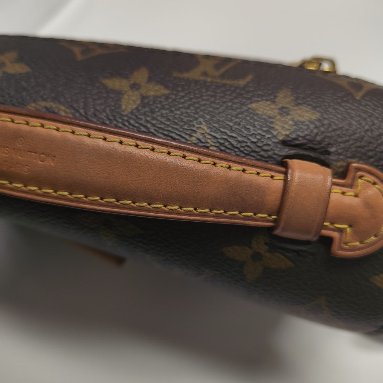 MÉTIS EAST WEST Monogram Coated Canvas Brown
