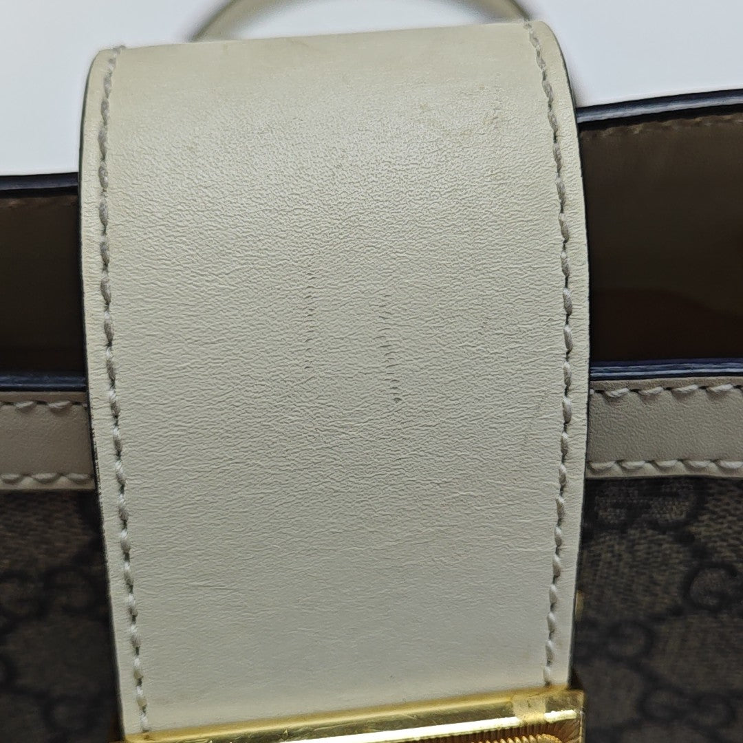 Padlock Small Monogram Coated Canvas Beige