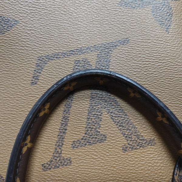 ONTHEGO MM Monogram Coated Canvas Brown