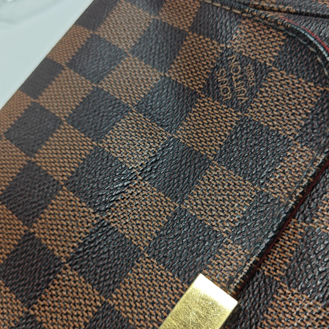 FAVORITE PM Damier Ebene Coated Canvas Brown