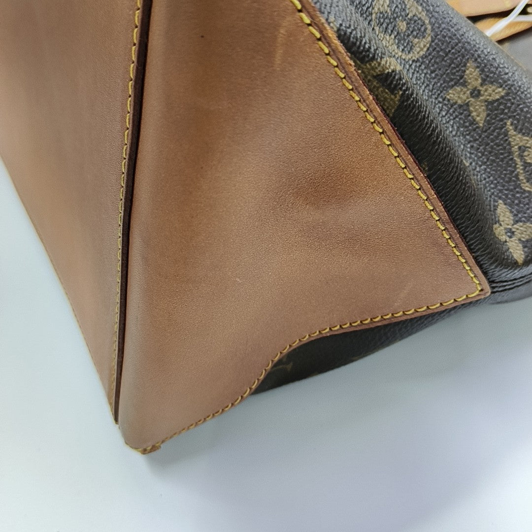 PIANO Monogram Coated Canvas Brown