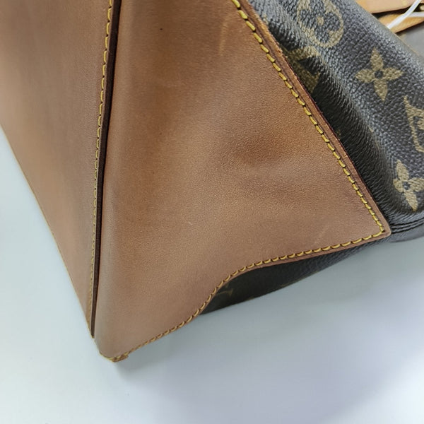 PIANO Monogram Coated Canvas Brown