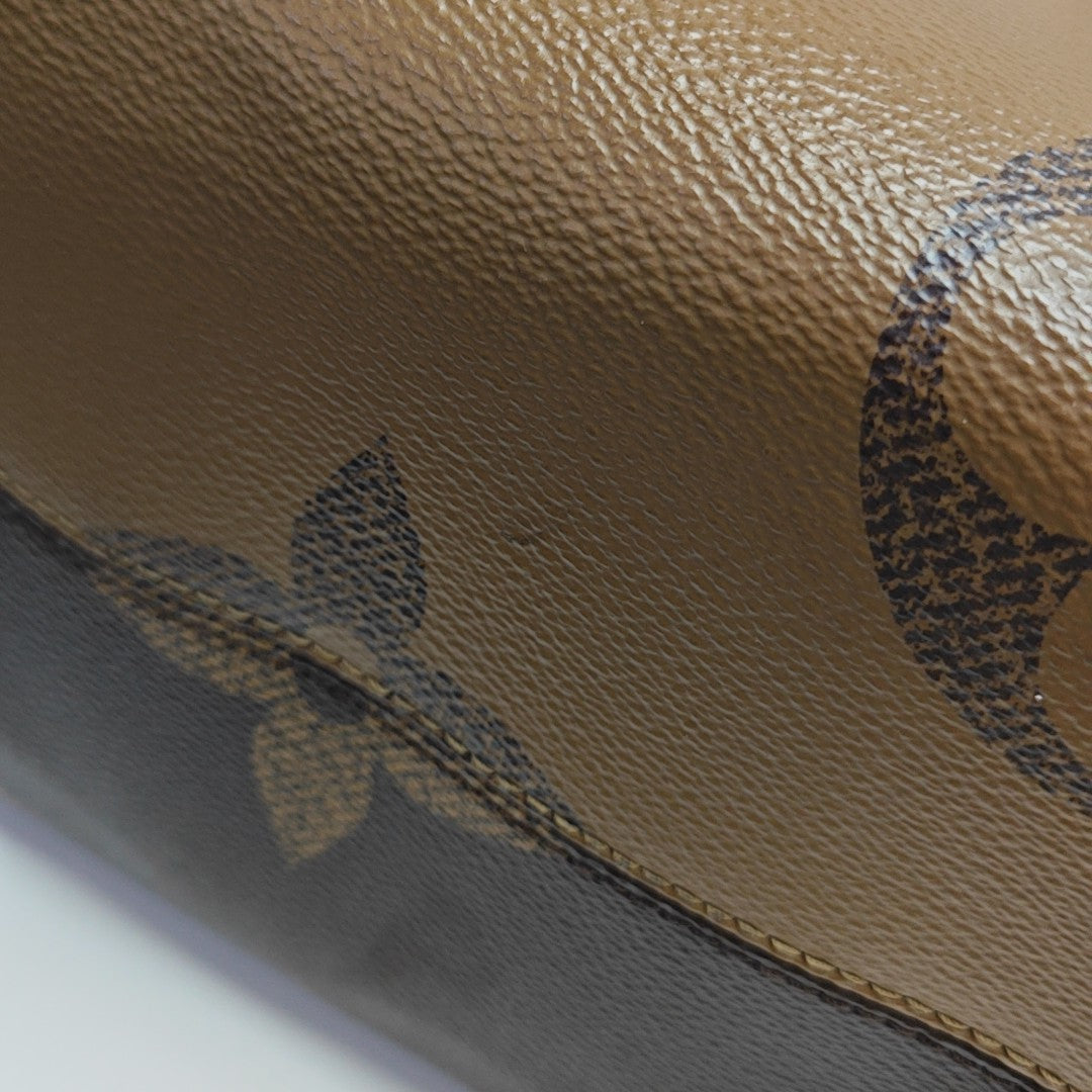 ONTHEGO MM Monogram Coated Canvas Brown