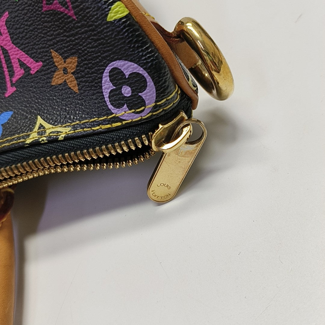 LV × TM RITA Monogram Coated Canvas Black