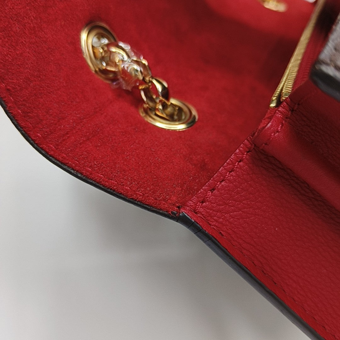 VICTOIRE Monogram Coated Canvas Brown