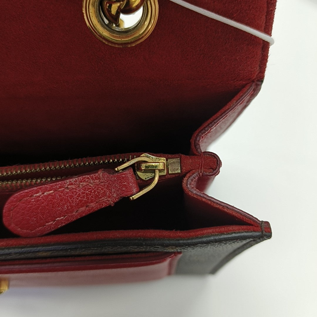 VICTOIRE Monogram Coated Canvas Brown