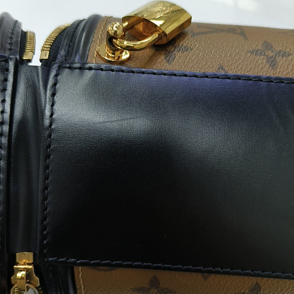 CANNES PM Monogram Coated Canvas Brown