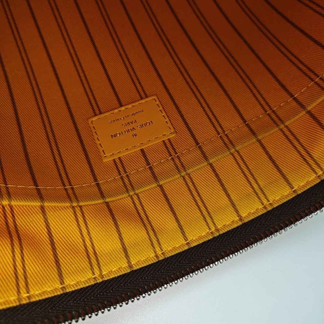 DAILY Monogram Coated Canvas Brown