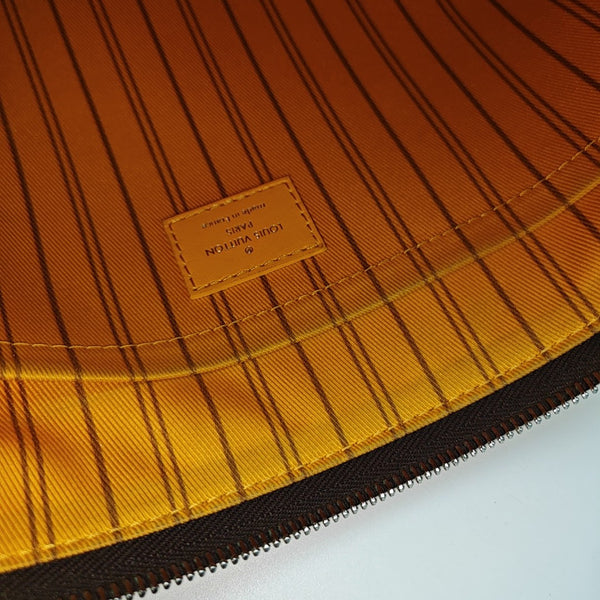 DAILY Monogram Coated Canvas Brown
