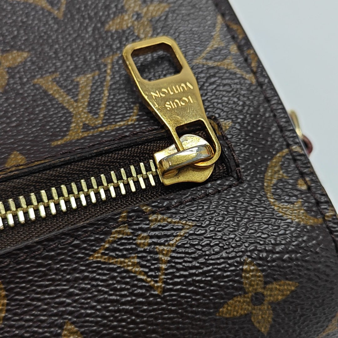 MÉTIS MM Monogram Coated Canvas Brown