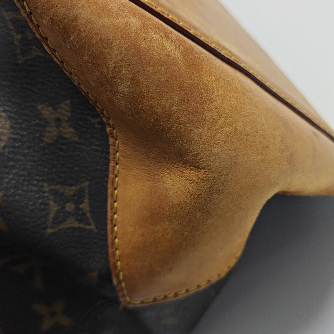 PIANO Monogram Coated Canvas Brown