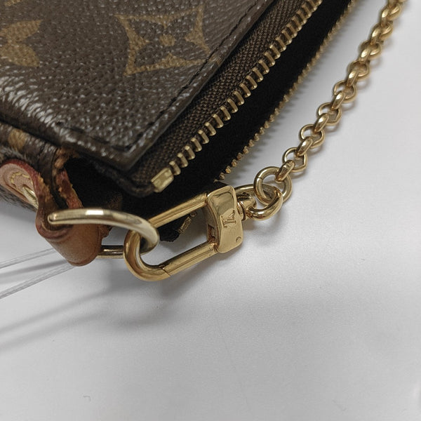 EVA Monogram Coated Canvas Brown