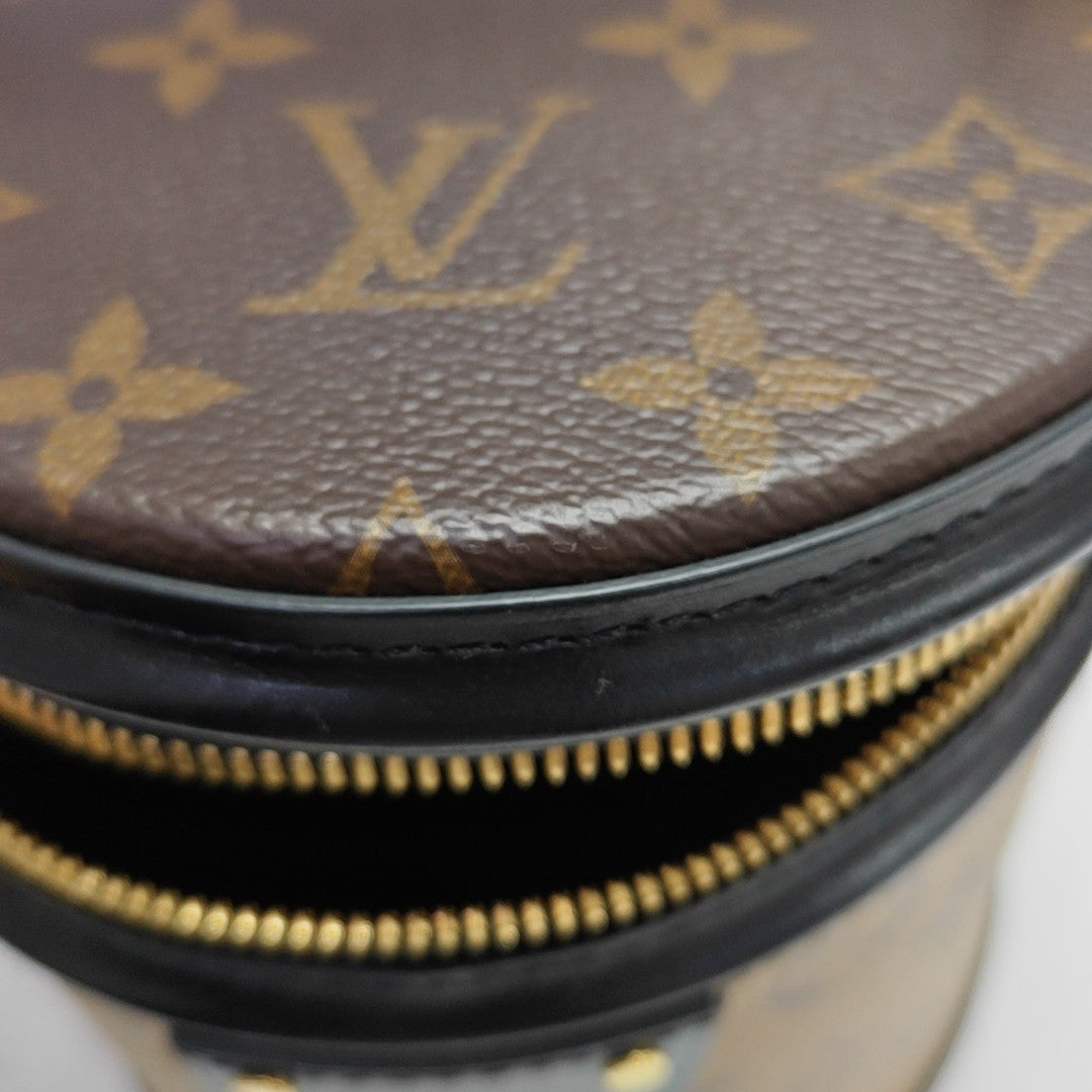 CANNES PM Monogram Coated Canvas Brown