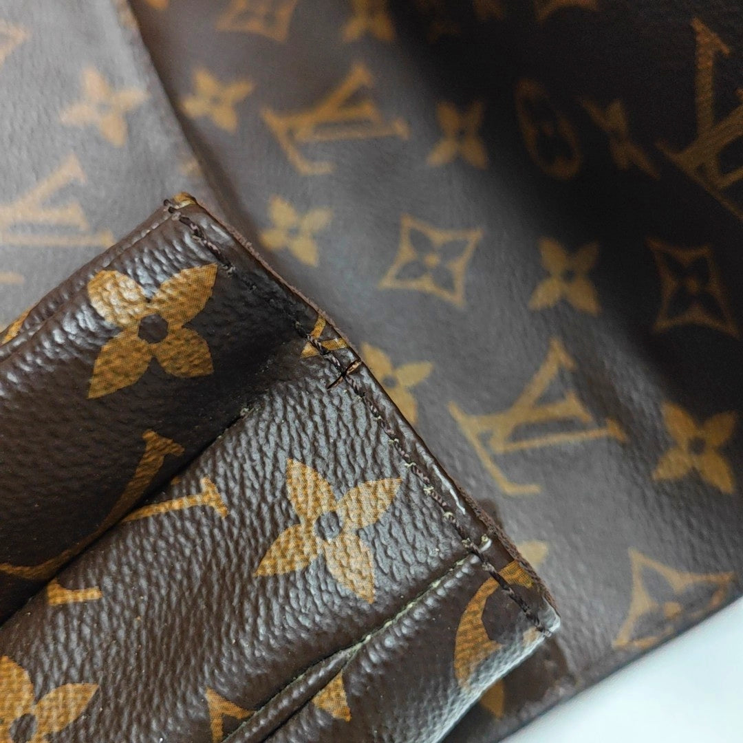 MÉTIS MM Monogram Coated Canvas Brown